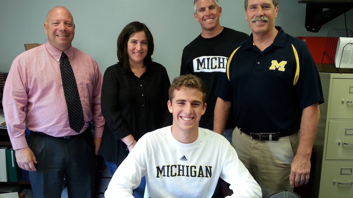 Joseph "Joey" Hertgen signs with the University of Michigan as a soccer player.