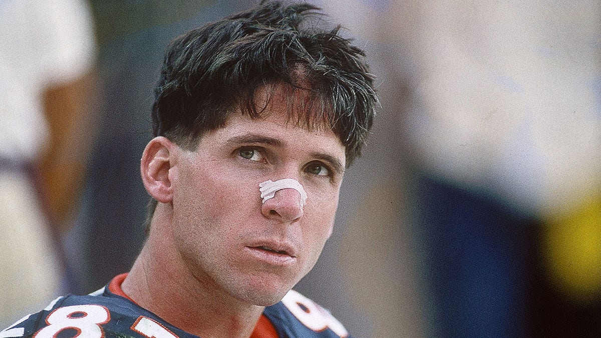 Ed McCaffrey on bench