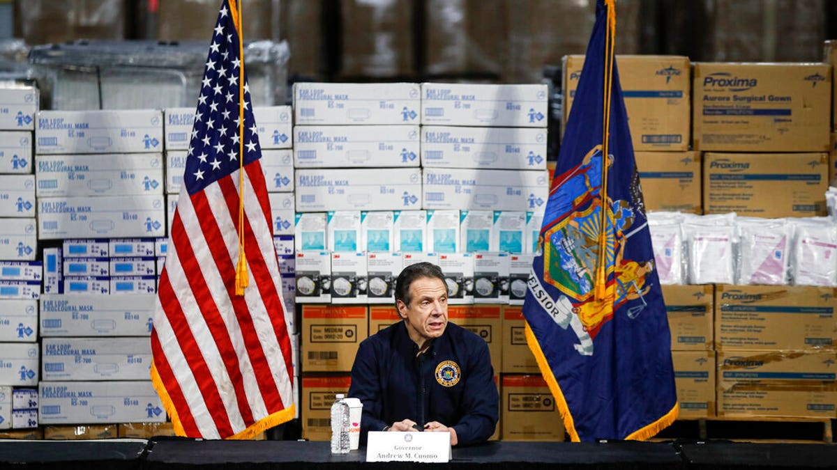 Gov. Andrew Cuomo speaks during a news conference against a backdrop of medical supplies at the Jacob Javits Center that will house a temporary hospital in response to the COVID-19 outbreak in New York.