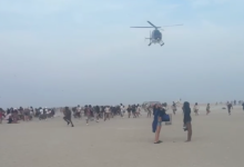 Hundreds of teenagers transform peaceful beach into chaos as police forced to break up fights