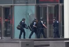 2 NYPD officers among 6 shot inside midtown Manhattan Blackstone building, shooter down