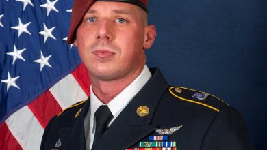 Soldier braved hypothermia, debris in nighttime water rescue