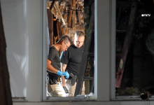 Couple found tied up and burned to death in home near famous racetrack as police hunt for suspect
