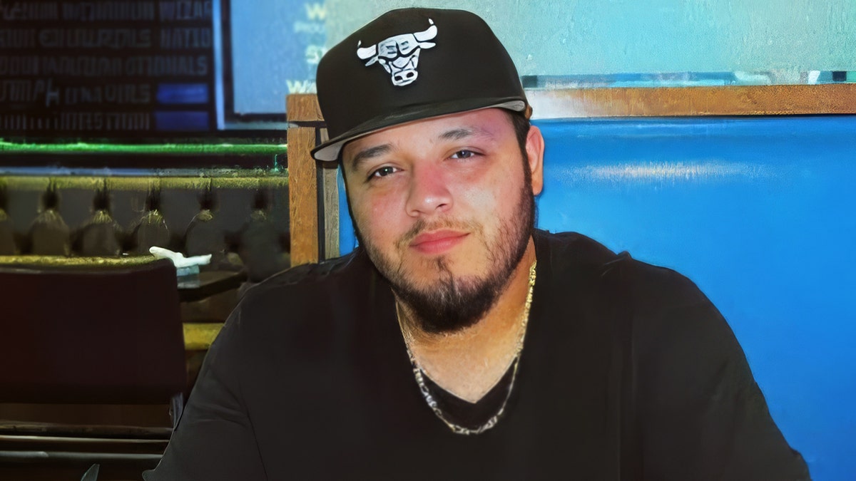A headshot of Kilmar Abrego Garcia wearing a Chicago Bulls hat