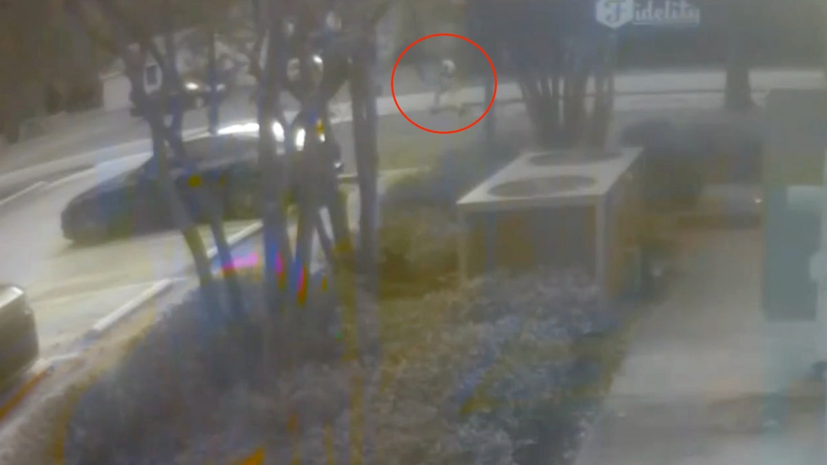 Robber running away from bank