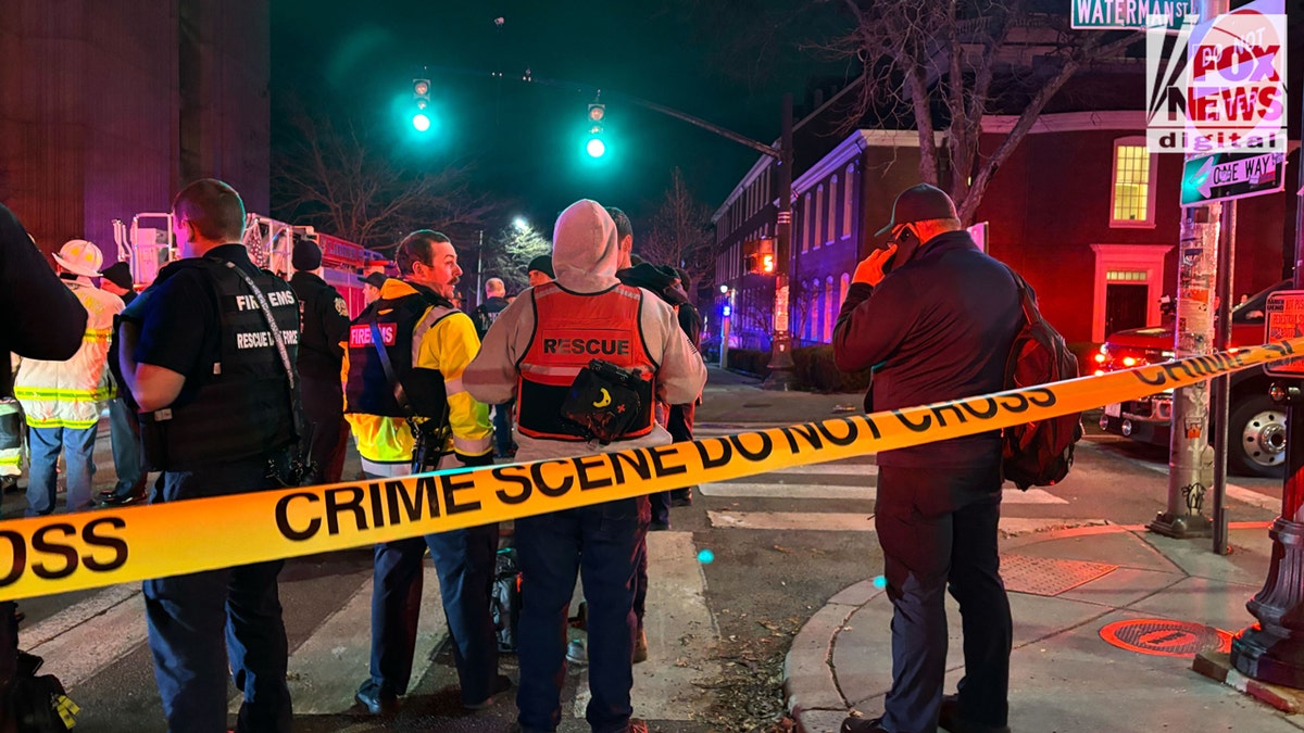 Crime scene tape blocks off streets near Brown University as investigation continues in Providence, R.I., Saturday, Dec. 13, 2025.