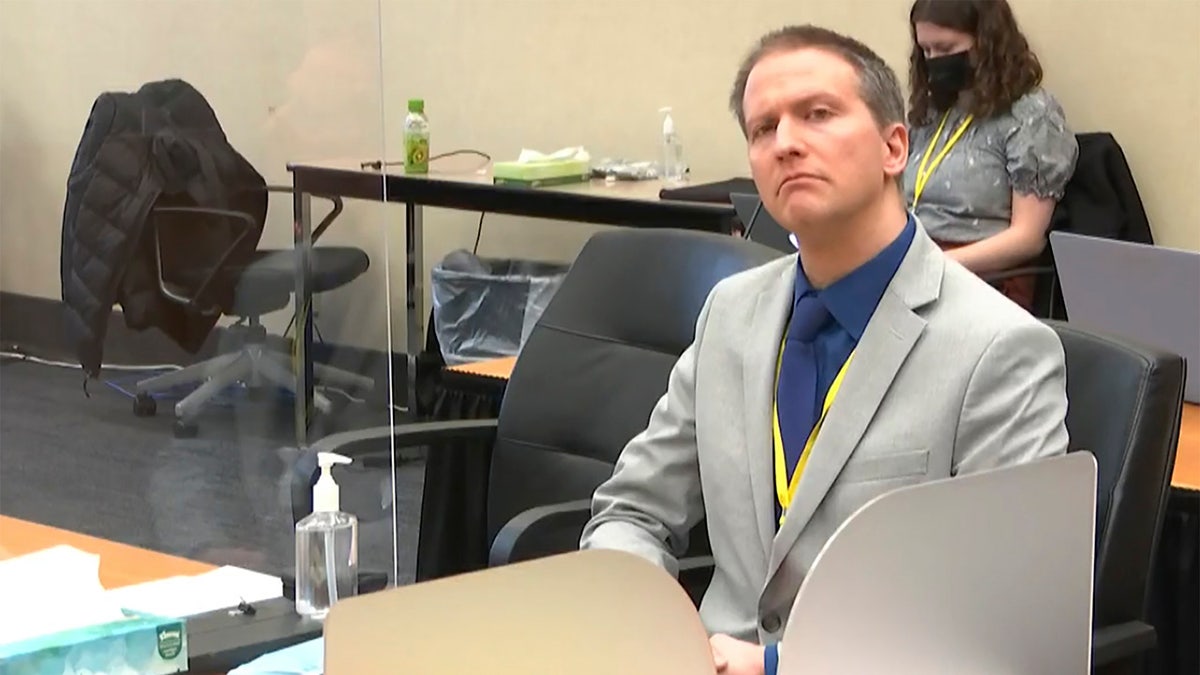 Derek Chauvin listening during trial
