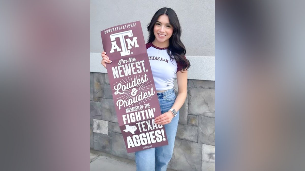 Brianna Aguilera with a Texas A&M University poster