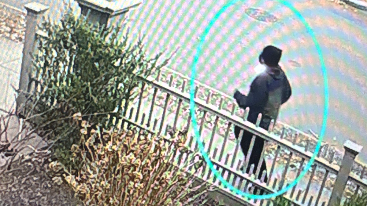 The person of interest running in a still frame taken from video