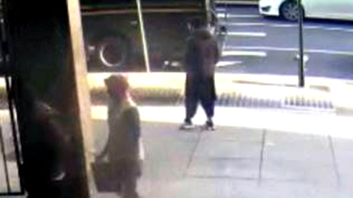 suspect seen looking down sidewalk