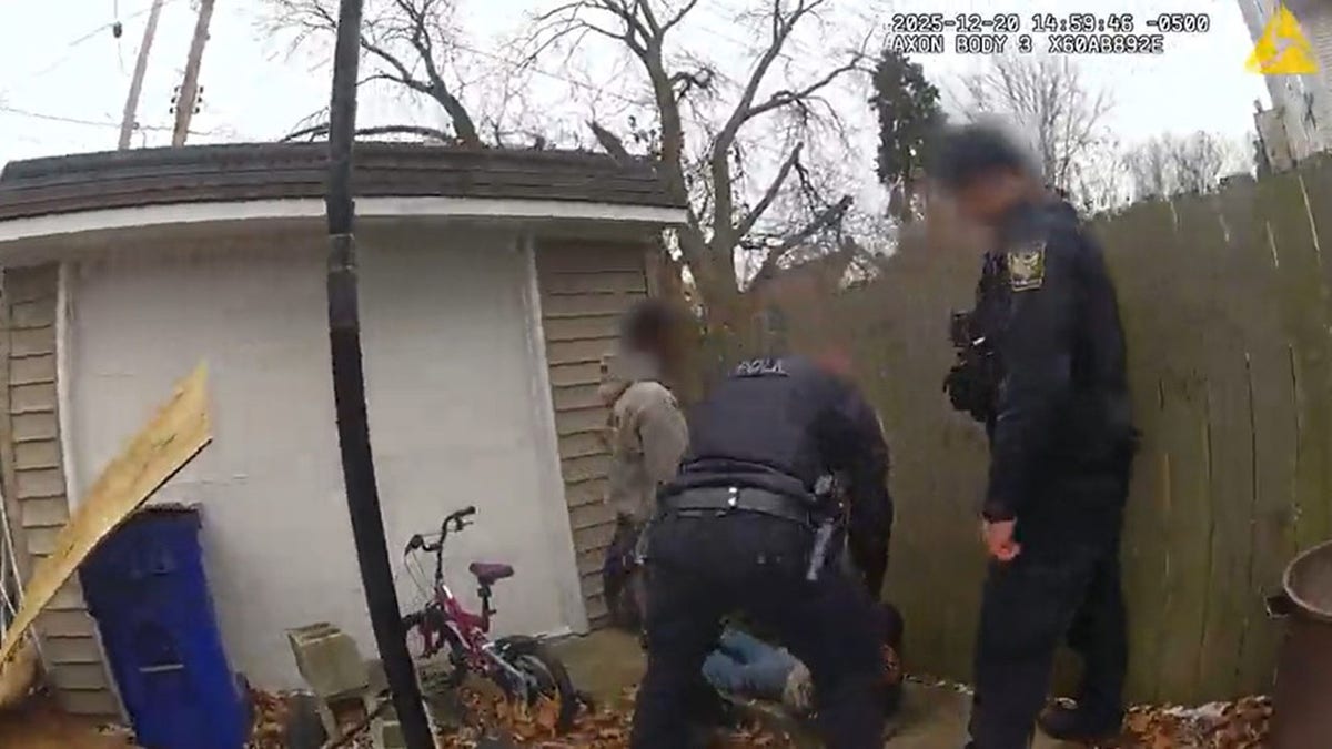 Newburgh Heights Police Department with two young car theft suspects