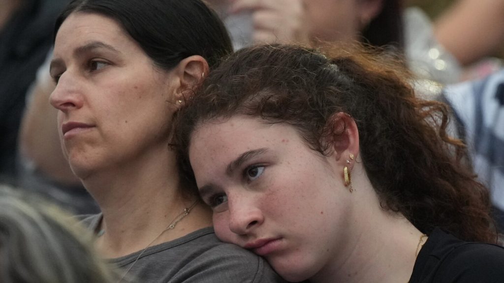 Mourners gather at Bondi Beach to honor shooting victims