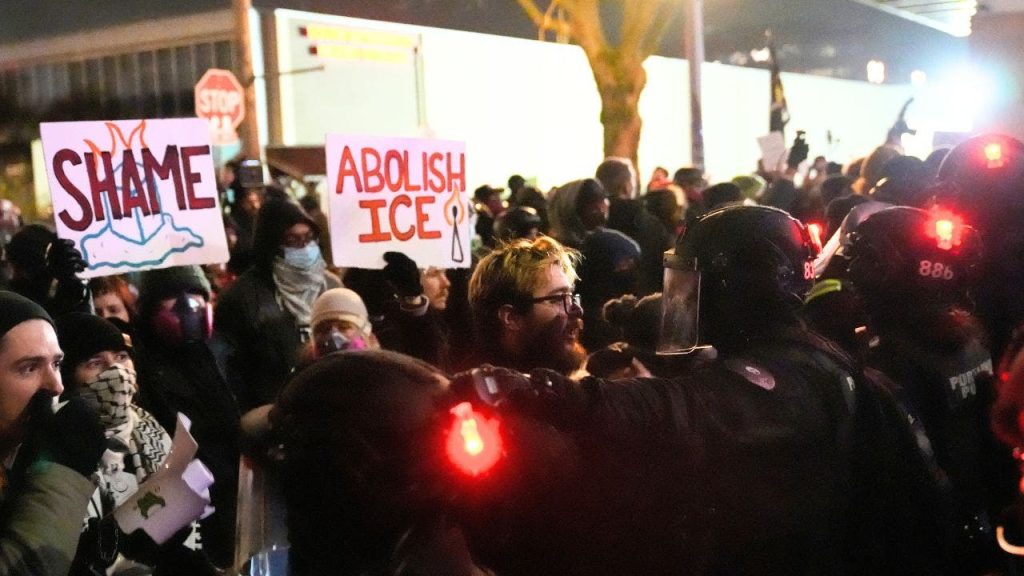Portland agitators clash with police after 2 shot by federal immigration agent Portland agitators clash with police after 2 shot by federal immigration agent