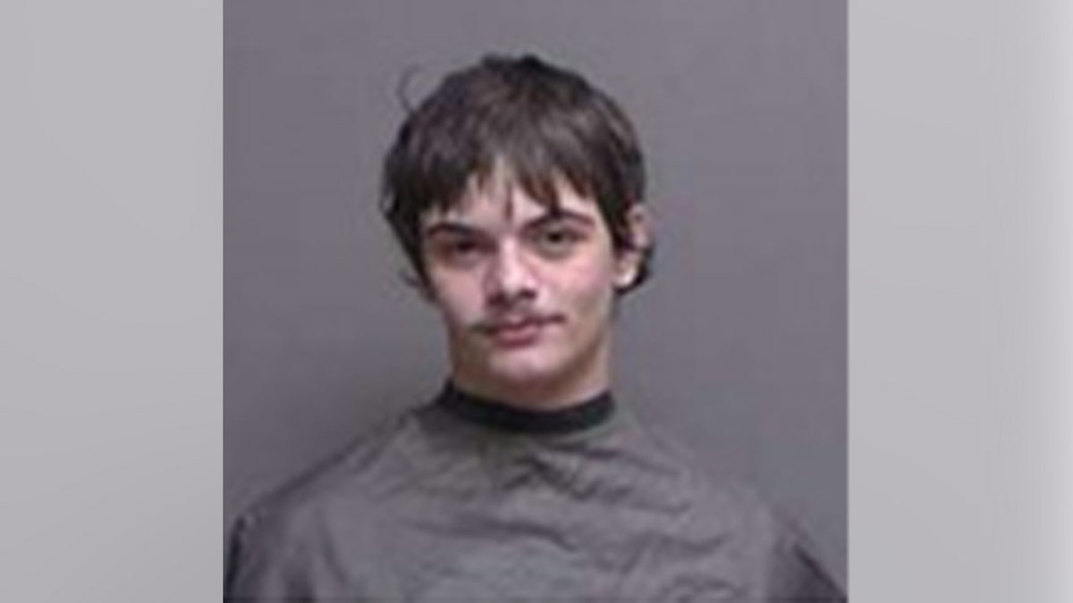 Junior Bishop in a mugshot