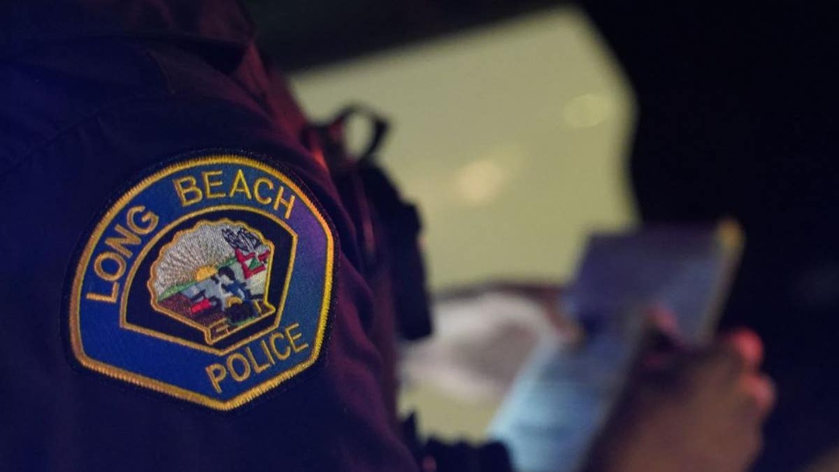 Long Beach police officer writing ticket