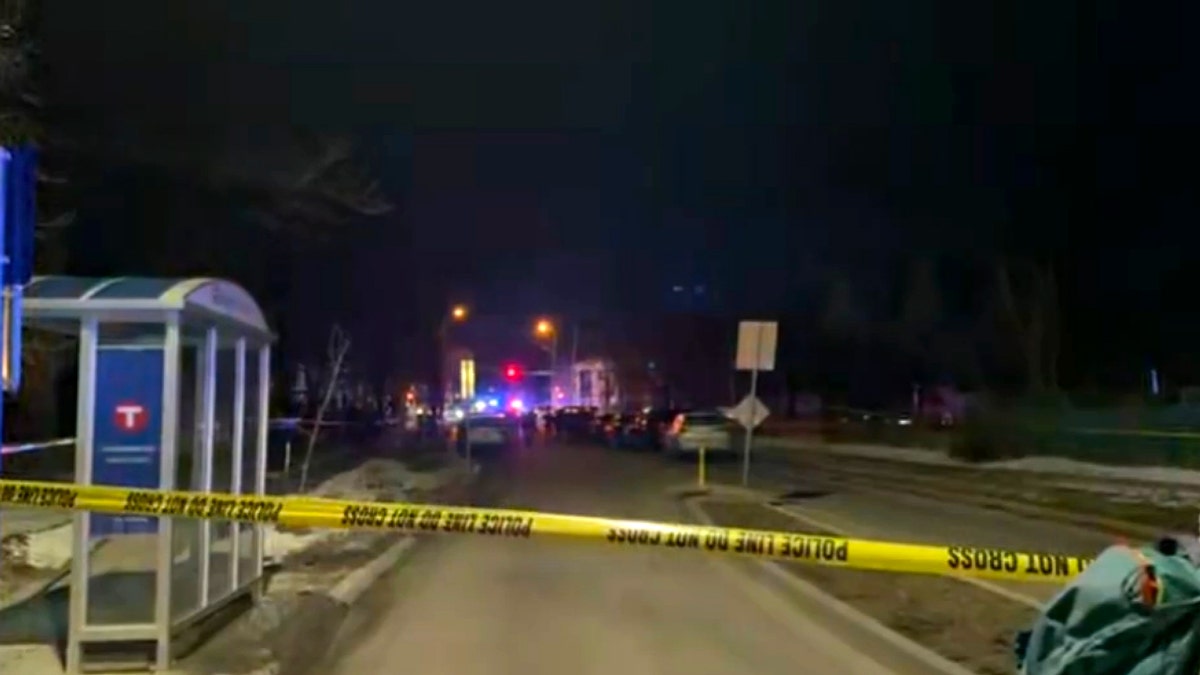 Police tape blocking off an area in a Minneapolis neighborhood