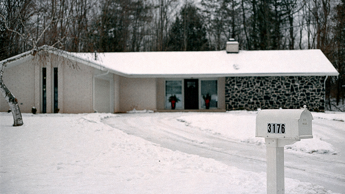 The home at center of Supreme Court property theft case, covered in snow.