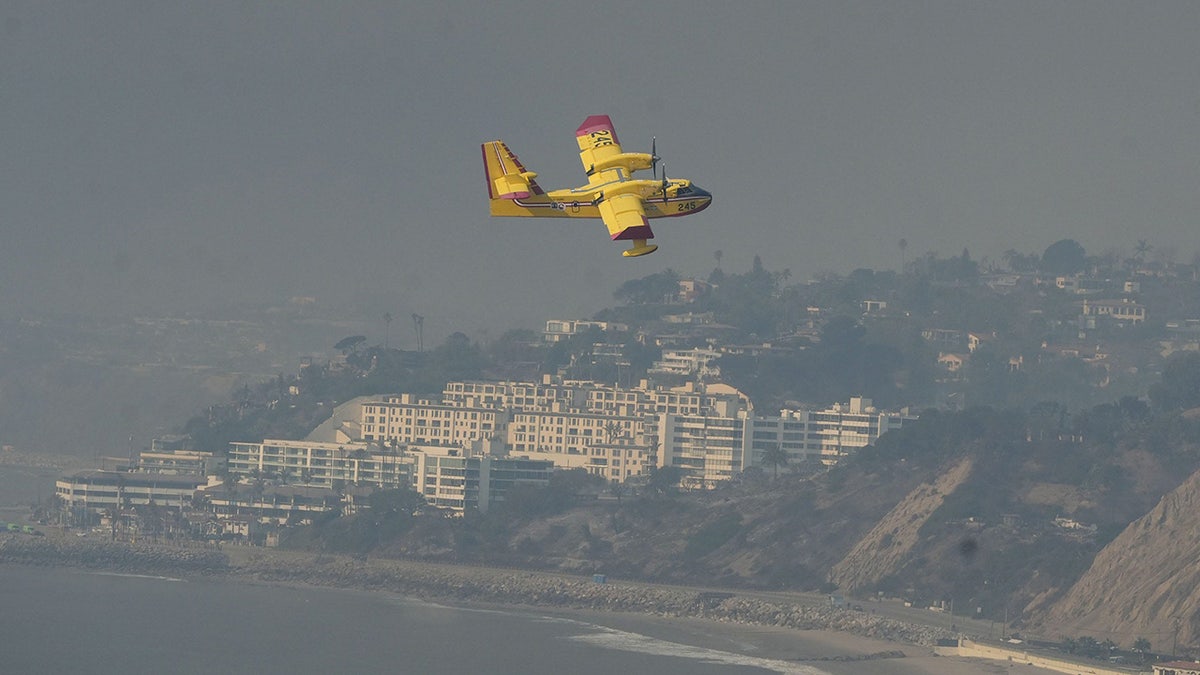 Airplanes scoop up water from the ocean