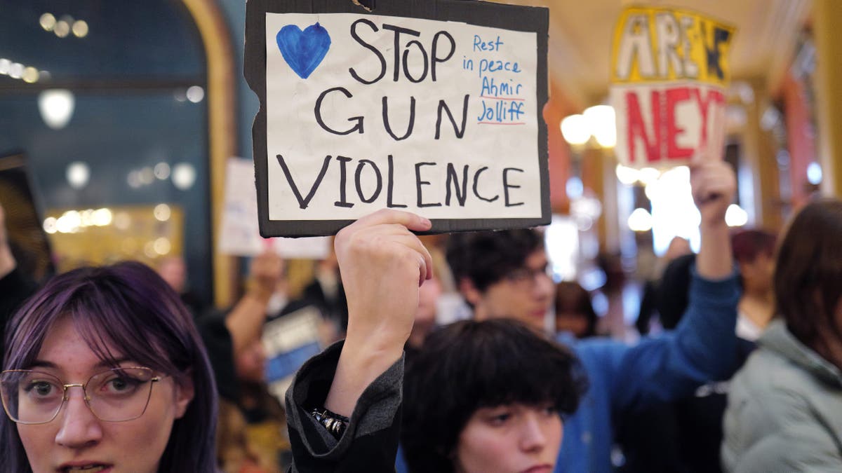 Students demonstrate for stricter gun control legislation as part of a March for Our Lives rally at the Iowa state capitol building in Des Moines on Jan. 8, 2024.