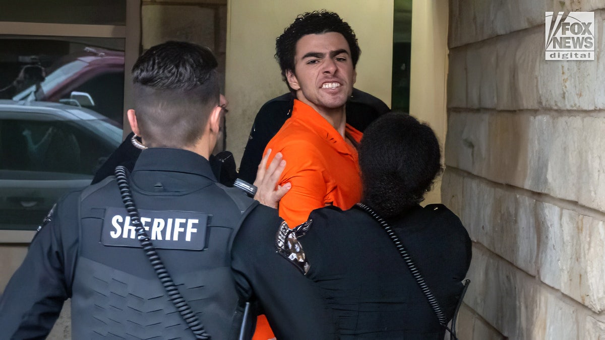 Luigi Mangione, the suspect in the murder of United Healthcare CEO, Brian Thompson shouts as he is led into court