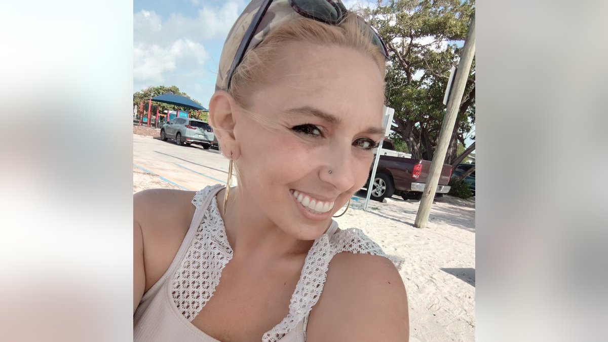 Nadyne Marie Tillman seen in a picture on a beach.