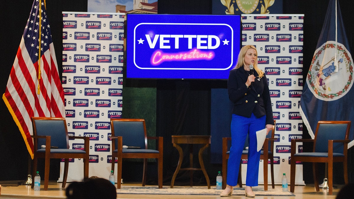Ellen Gustafson emcees during the