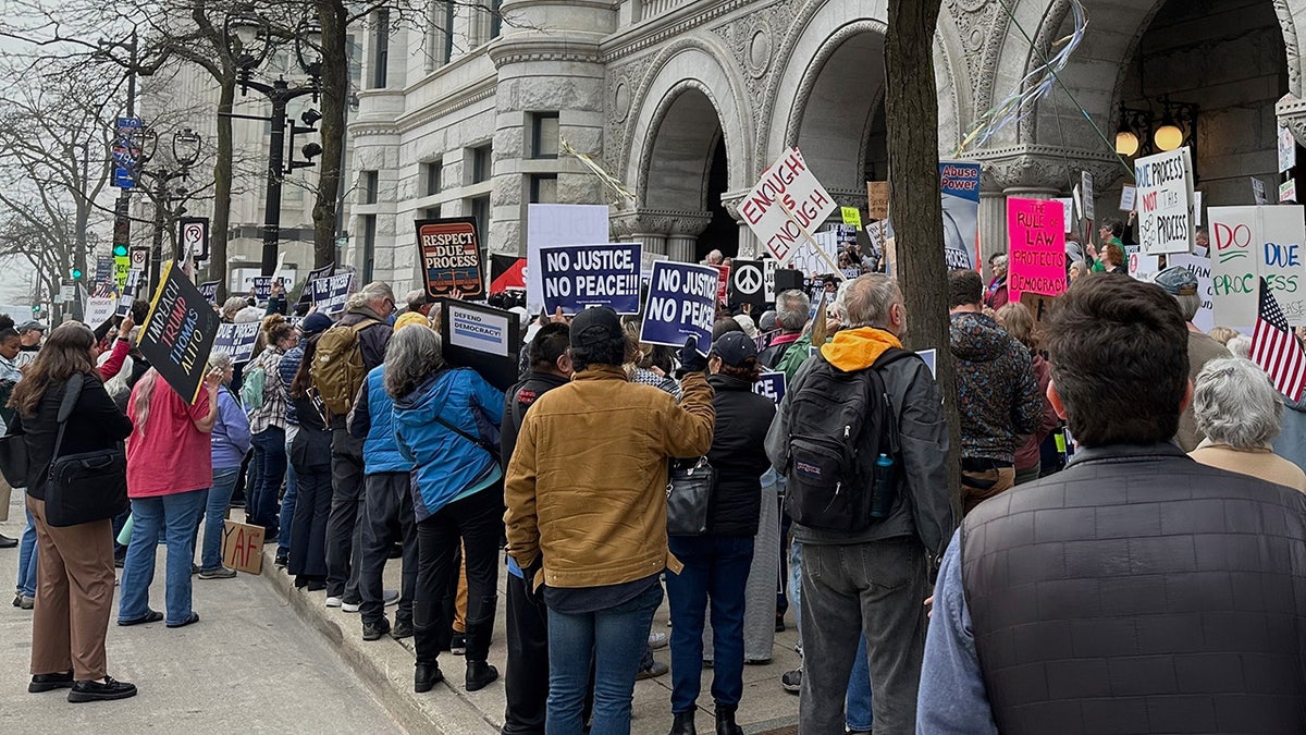 Supporters of Judge Hannah Dugan protest outside the United States Federal Building and Courthouse in Milwaukee, Wis.