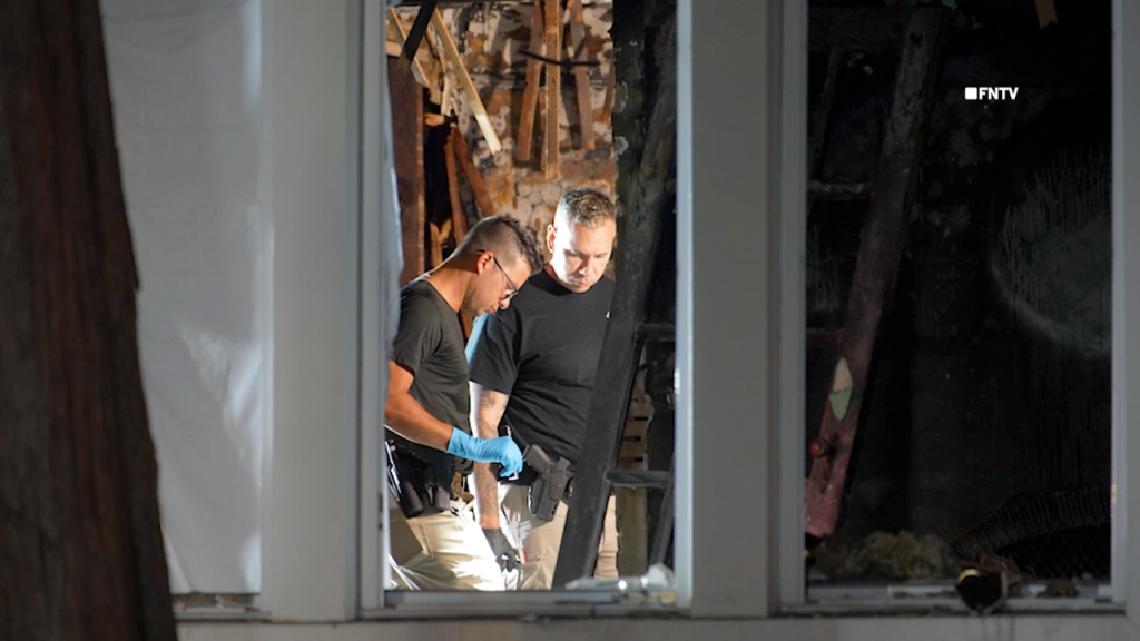 Couple found tied up and burned to death in home near famous racetrack as police hunt for suspect Couple found tied up and burned to death in home near famous racetrack as police hunt for suspect