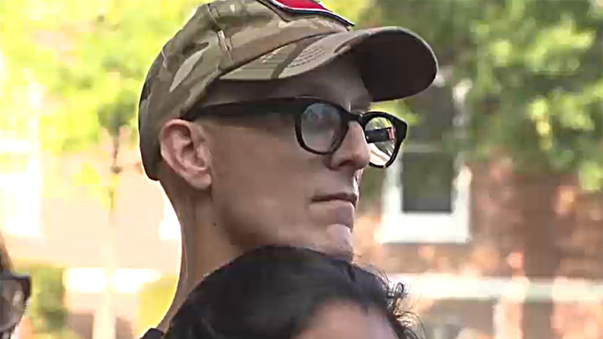 Redneck Revolt professor, Dwayne Dixon wearing a hat