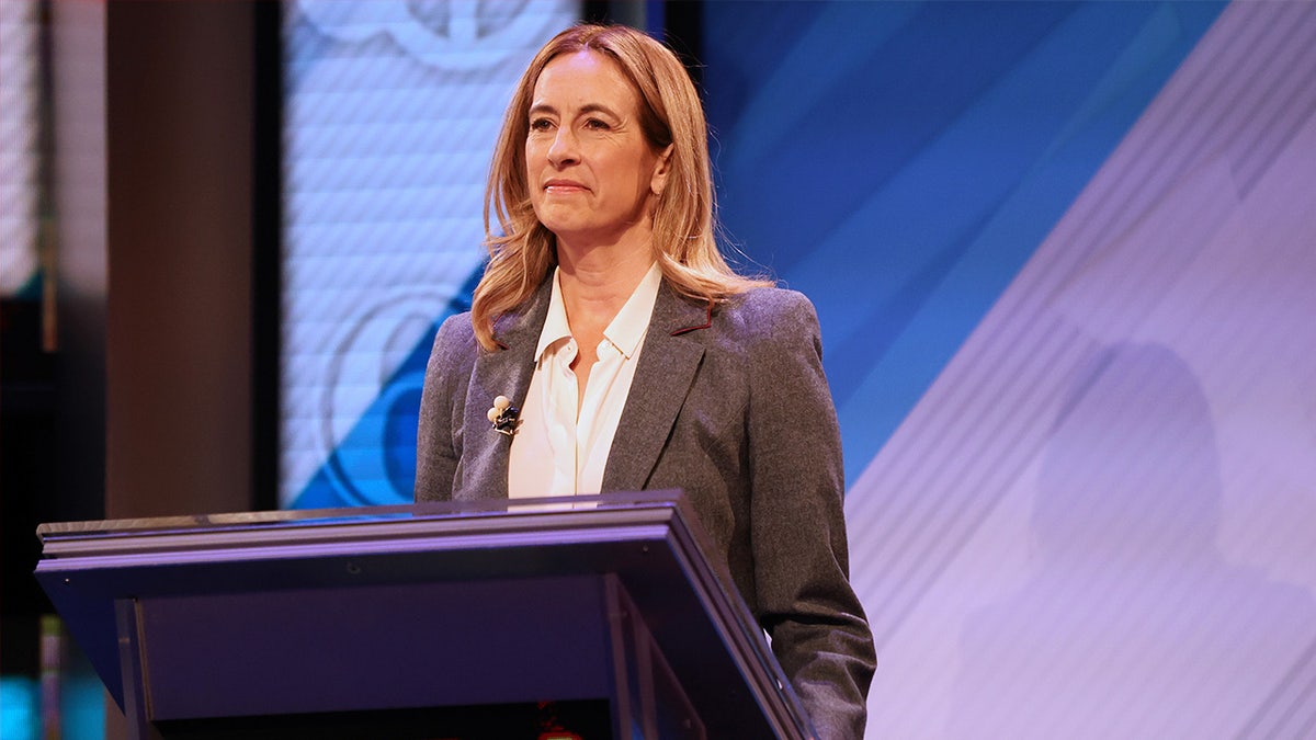 Mikie Sherrill stands at a podium
