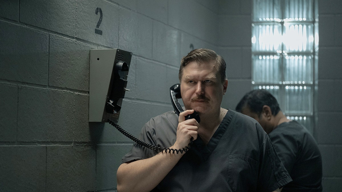 Michael Chernus as John Wayne Gacy during a prison phone call.