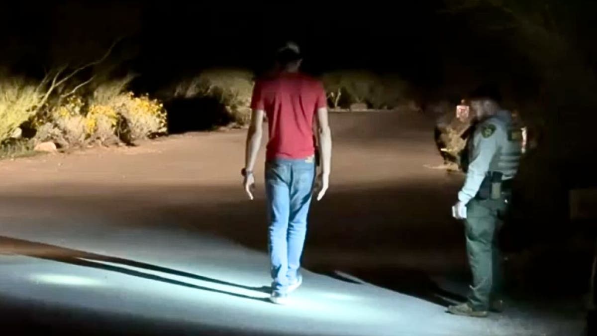 Man walking in straight line during sobriety test near Nancy Guthrie home