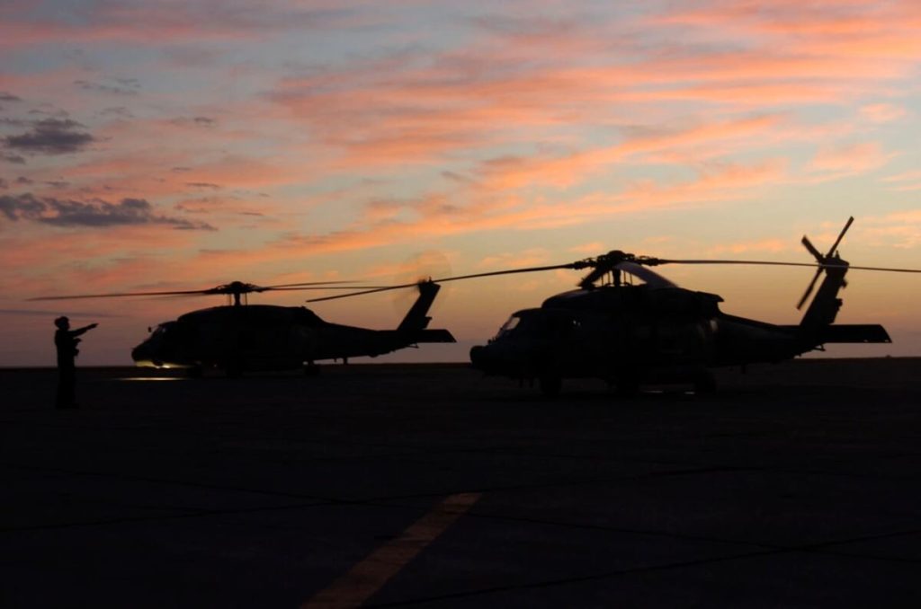 Navy’s ‘dinosaur’ carrier delivery plane flies into sunset